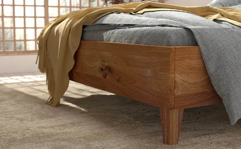 Drewniane łóżko retro z tapicerowaniem