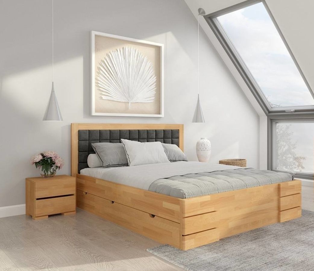Dlaczego warto wybrać łóżko drewniane z szufladami?